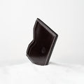 Berling Heirloom Anthracite card holder, Shell Cordovan, dark gray - front view, standing in snow