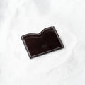 Berling Heirloom Anthracite card holder, Shell Cordovan, dark gray - top view in snow