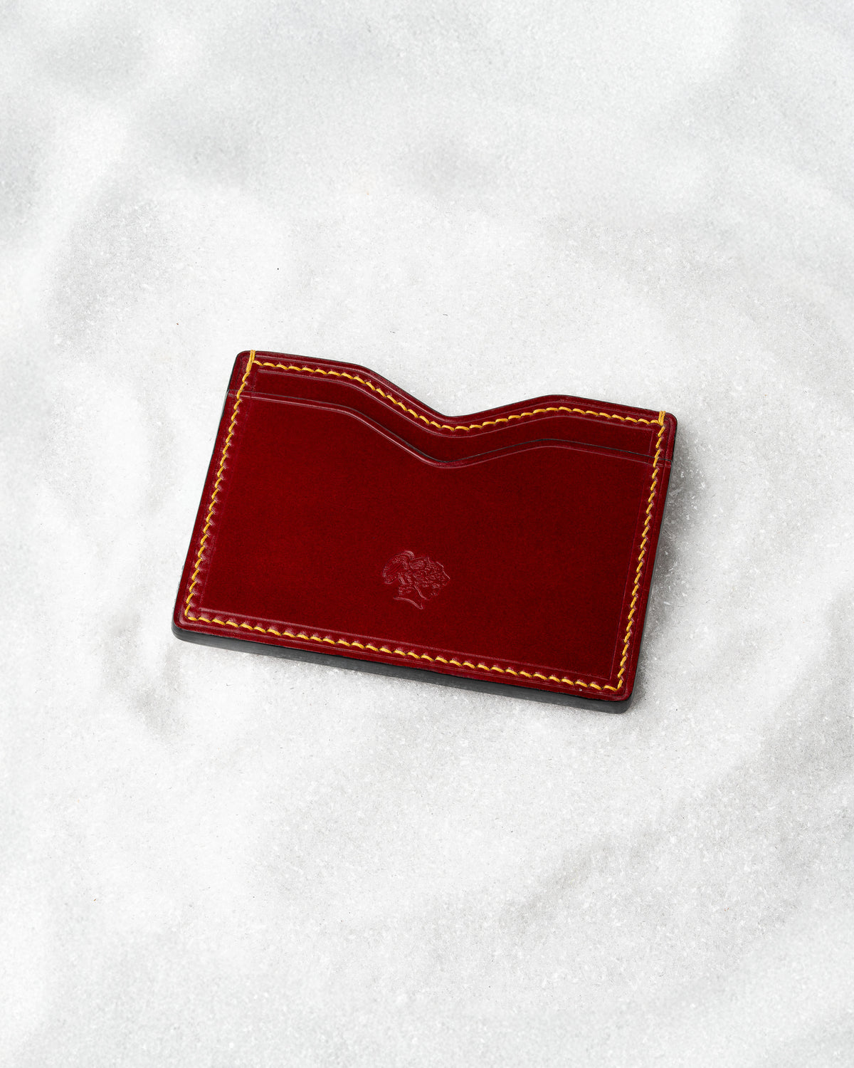 Berling Heirloom Crimson card holder, Shell Cordovan, red - top view in snow