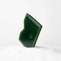 Berling Heirloom Emerald card holder, Shell Cordovan, green - front view, standing in snow