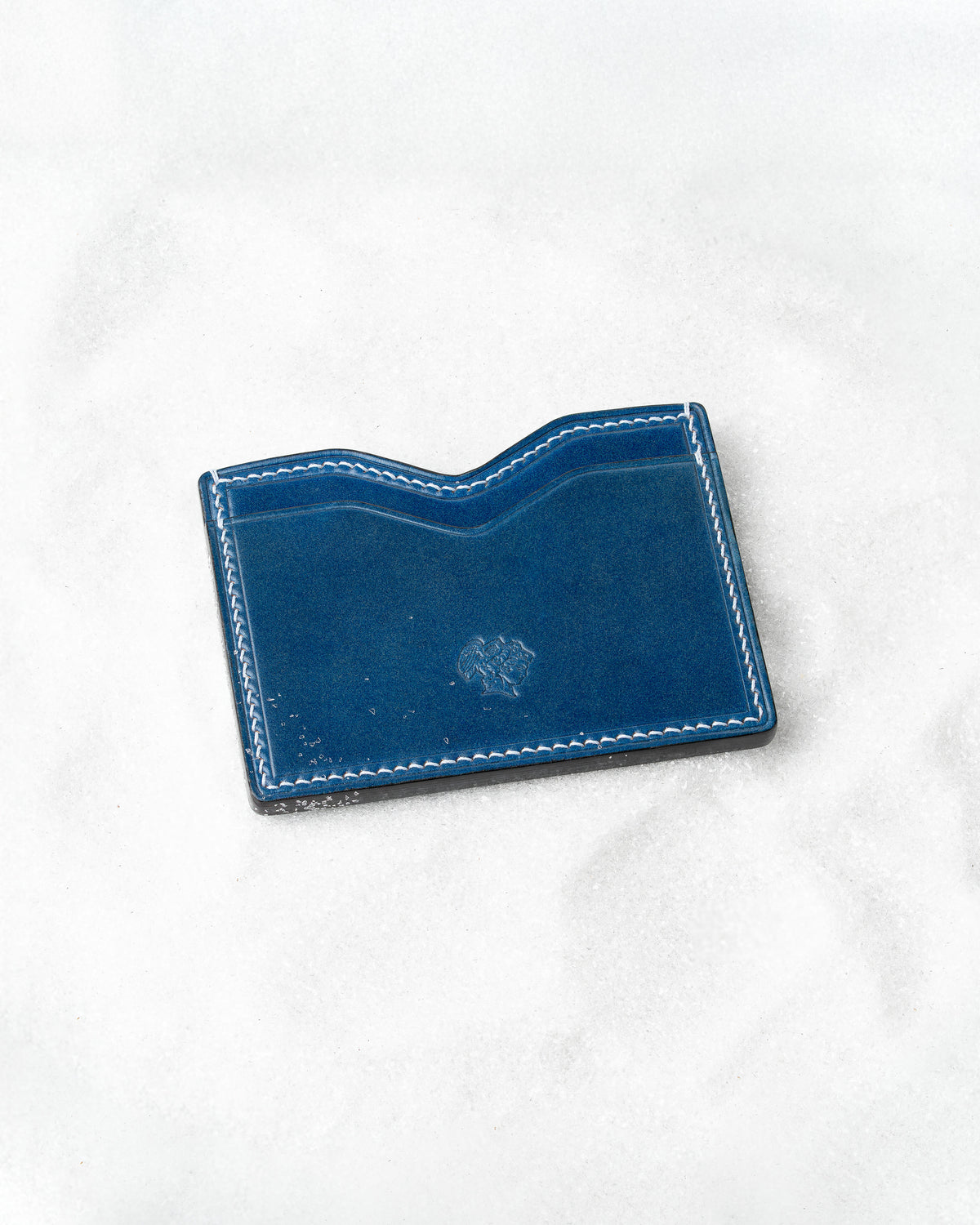 Berling Heirloom Lapis card holder, Shell Cordovan, blue - top view in snow
