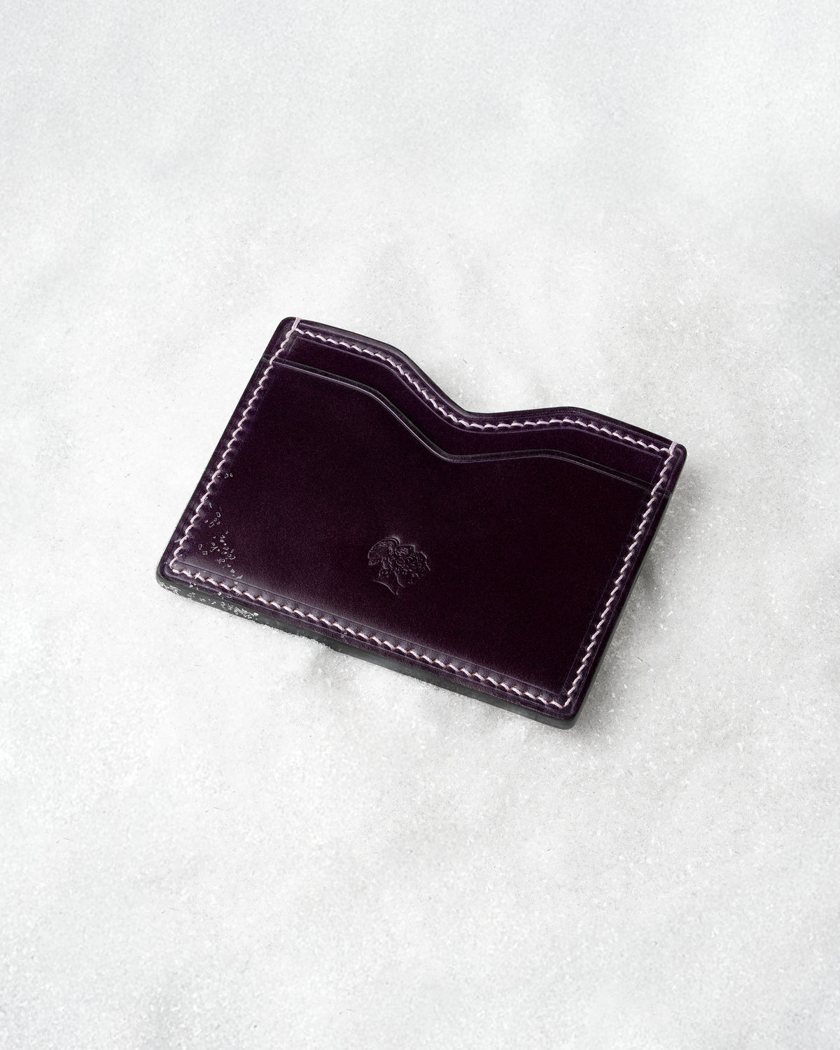 Berling Heirloom Tyrian card holder, Shell Cordovan, purple - top view in snow