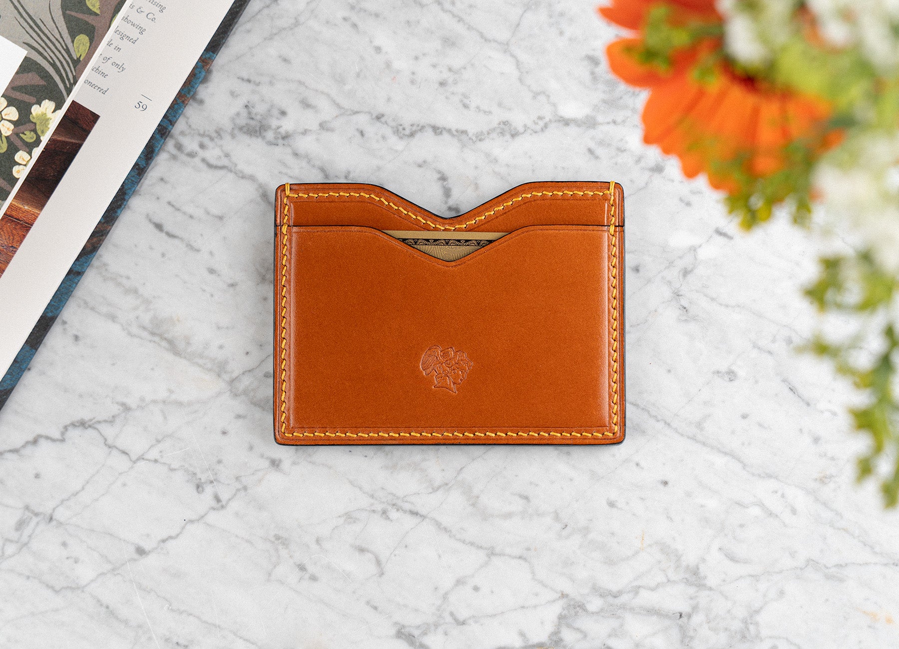 Amber shell cordovan card holder by Berling shown new on day 1, before patina has developed.