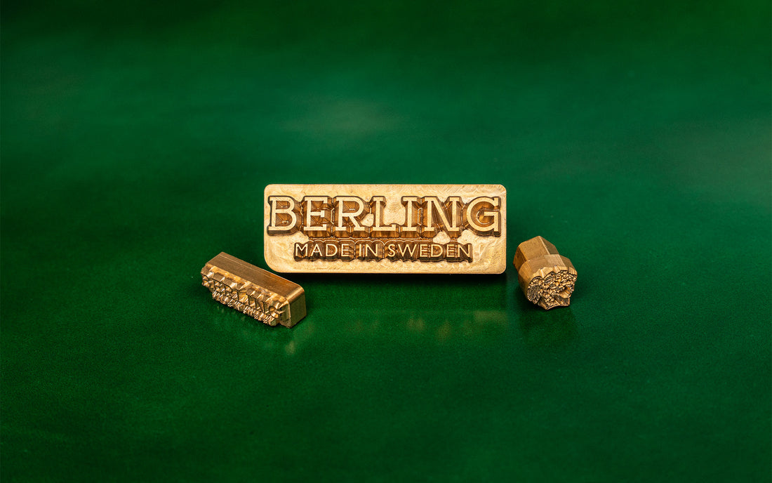 Berling's brass maker's mark and decorative stamps on emerald green shell cordovan.